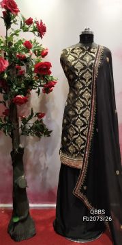 Very elegant pure brocket silk suit in black colour