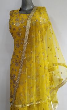 Bright Yellow sharara suit with sequenced worked