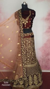 Full heavy embroidered velvet maroon lehenga