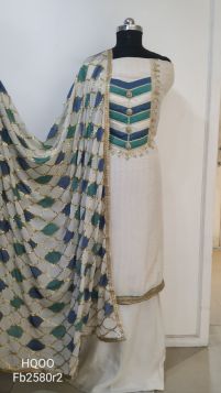 Party wear white suit with designer neck and heavy dupatta